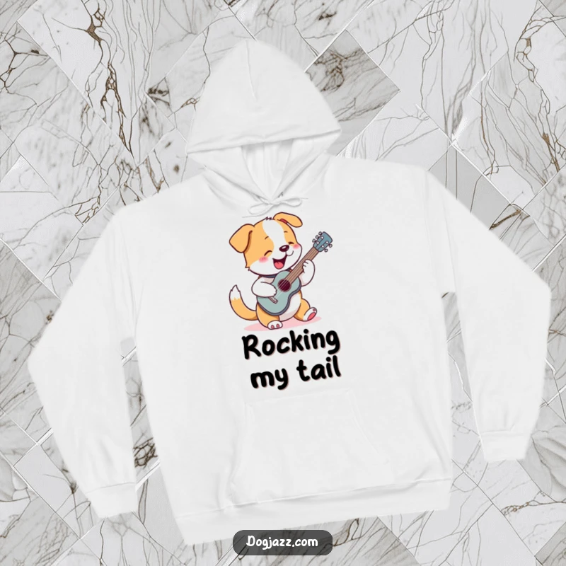 Funny hoodie featuring a happy dog enthusiastically strumming a tiny guitar, embodying musical passion and coziness.
